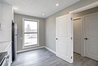 Photo 4: 563 Abinger Road NE in Calgary: Abbeydale Row/Townhouse for sale : MLS®# A1257421