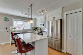 Photo 9: 127 Fireside Parkway: Cochrane Row/Townhouse for sale : MLS®# A1212822