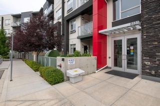 Photo 2: 107 8531 8A Avenue SW in Calgary: West Springs Apartment for sale : MLS®# A1255981