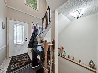 Photo 3: 6 834 2 Avenue NW in Calgary: Sunnyside Row/Townhouse for sale : MLS®# A1230397