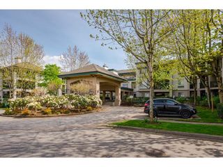 Photo 1: 313 19528 FRASER Highway in Surrey: Cloverdale BC Condo for sale in "The Fairmont" (Cloverdale)  : MLS®# R2684158