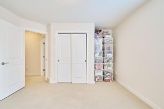 Photo 32: 2 Somme Mews SW in Calgary: Garrison Woods Row/Townhouse for sale : MLS®# A2051918