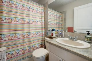 Photo 18: 10 Crystal Shores Cove: Okotoks Row/Townhouse for sale : MLS®# A1217849