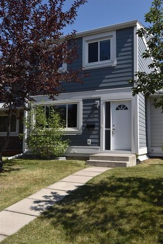 Photo 1: 816 MADEIRA Drive NE in Calgary: Marlborough Park Row/Townhouse for sale : MLS®# C4262604