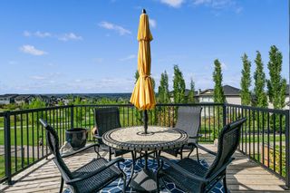 Photo 1: 201 Crestmont Drive SW in Calgary: Crestmont Detached for sale : MLS®# A2053231