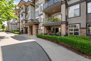 Photo 2: 111 2068 SANDALWOOD Crescent in Abbotsford: Central Abbotsford Condo for sale in "The Sterling" : MLS®# R2897158