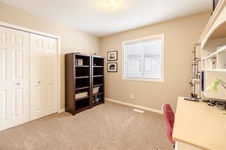 Photo 18: 325 BRIDLERIDGE View SW in Calgary: Bridlewood House for sale : MLS®# C4177139