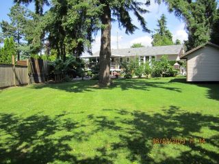 Photo 1: 12494 102ND Avenue in Surrey: Cedar Hills House for sale in "St. Helen's Park" (North Surrey)  : MLS®# F1404669