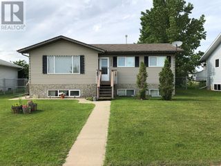 Photo 1: 2506 8 Avenue in Wainwright: House for sale : MLS®# A2036663