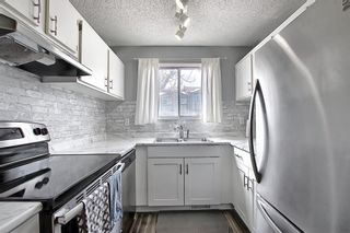 Photo 9: 104 7172 Coach Hill Road SW in Calgary: Coach Hill Row/Townhouse for sale : MLS®# A1097069