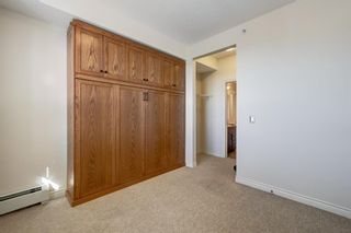 Photo 14: 415 26 Val Gardena View SW in Calgary: Springbank Hill Apartment for sale : MLS®# A1257390