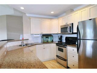 Photo 2: 408 12090 227TH Street in Maple Ridge: East Central Condo for sale in "FALCON PLACE" : MLS®# V996917
