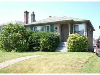 Photo 1: 4847 HENRY ST in Vancouver: Knight House for sale (Vancouver East)  : MLS®# V966805