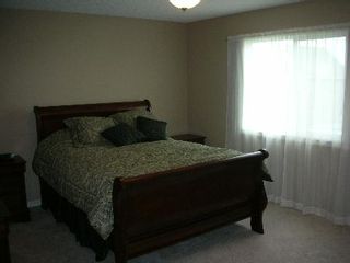 Photo 7: 1212 - 84 Street  SW: House for sale (Summerside) 