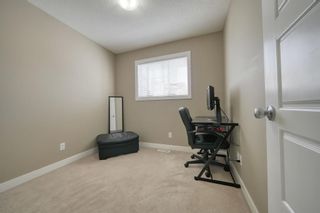 Photo 19: 555 Panatella Boulevard NW in Calgary: Panorama Hills Row/Townhouse for sale : MLS®# A2034434