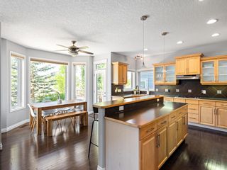 Photo 13: 39 Cougar Plateau Place SW in Calgary: Cougar Ridge Detached for sale : MLS®# A2053935