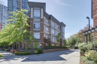 Photo 1: 310 10455 UNIVERSITY Drive in Surrey: Whalley Condo for sale in "D'COR" (North Surrey)  : MLS®# R2309445