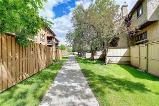 Photo 43: 24 GLAMIS Gardens SW in Calgary: Glamorgan Row/Townhouse for sale : MLS®# A1077235