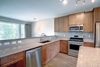 Photo 10: 98 River Heights Green: Cochrane Detached for sale : MLS®# A1231335
