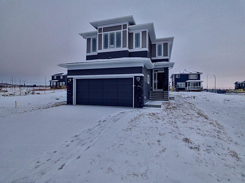 Main Photo: 62 Creekside Avenue SW in Calgary: C-168 Detached for sale : MLS®# A1178097