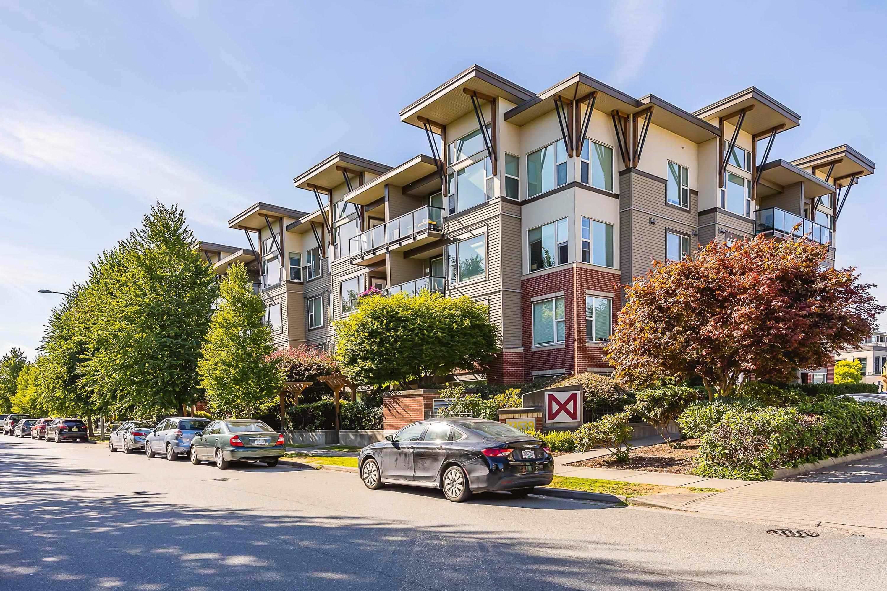 Main Photo: 410 33539 HOLLAND Avenue in Abbotsford: Central Abbotsford Condo for sale in "THE CROSSING" : MLS®# R2862430