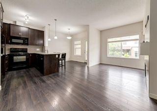 Photo 2: 125 Copperpond Landing SE in Calgary: Copperfield Row/Townhouse for sale : MLS®# A1225439
