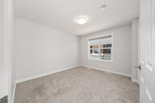 Photo 21: 131 Evanscrest Gardens NW in Calgary: Evanston Row/Townhouse for sale : MLS®# A1119890