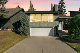 Photo 1: 743 Coach Bluff Crescent SW in Calgary: Coach Hill Detached for sale : MLS®# A2083358