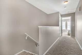 Photo 17: 107 Ascot Point SW in Calgary: Aspen Woods Row/Townhouse for sale : MLS®# A2033826