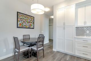 Photo 3: 211 100 Auburn Meadows Manor SE in Calgary: Auburn Bay Apartment for sale : MLS®# A1220075