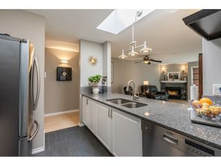 Photo 9: 407 20277 53 Avenue in Langley: Langley City Condo for sale in "THE METRO II" : MLS®# R2466451