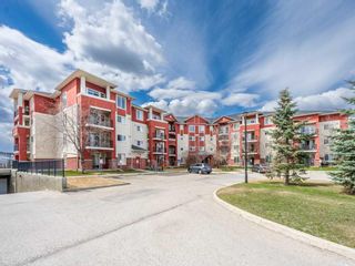 Photo 1: 110 156 Country Village Circle NE in Calgary: Country Hills Village Apartment for sale : MLS®# A2126145