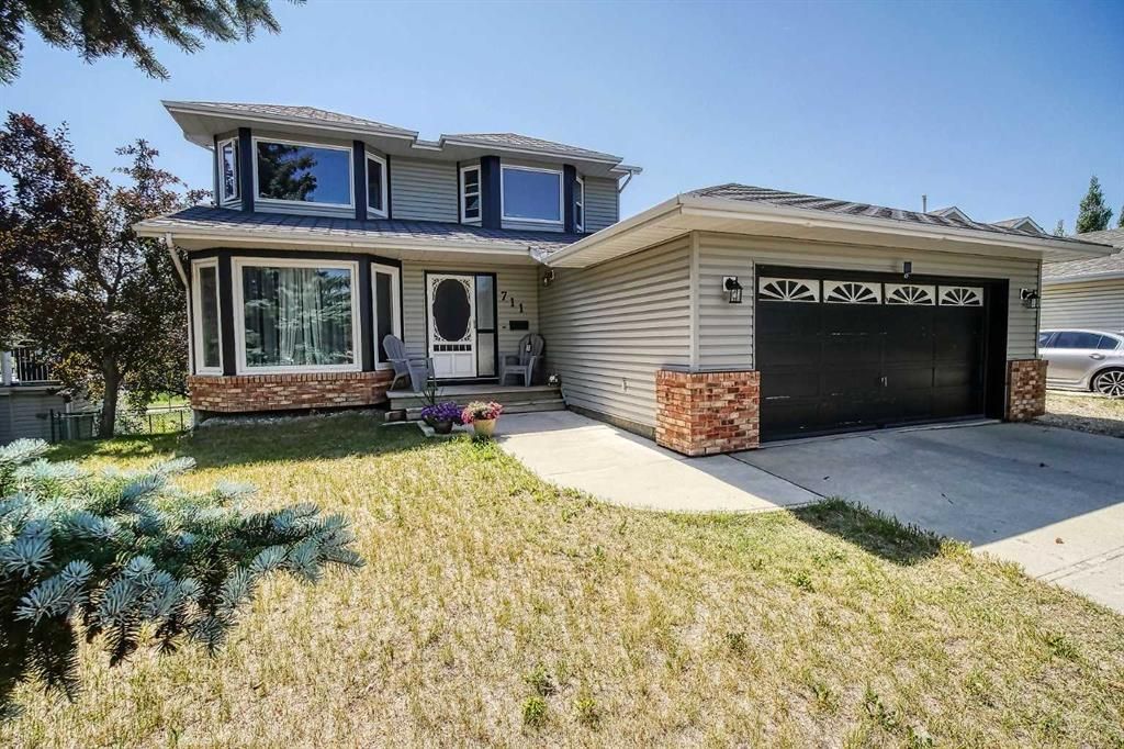 Main Photo: 711 High Country Drive NW: High River Detached for sale : MLS®# A2069878