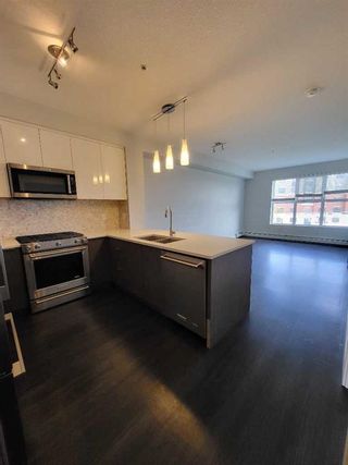 Photo 10: 1308 95 Burma Star Road SW in Calgary: Currie Barracks Apartment for sale : MLS®# A2053083