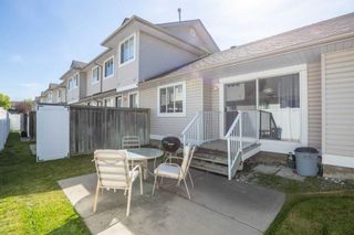 Photo 34: 10 4 Stonegate Drive NW: Airdrie Row/Townhouse for sale : MLS®# A2079977