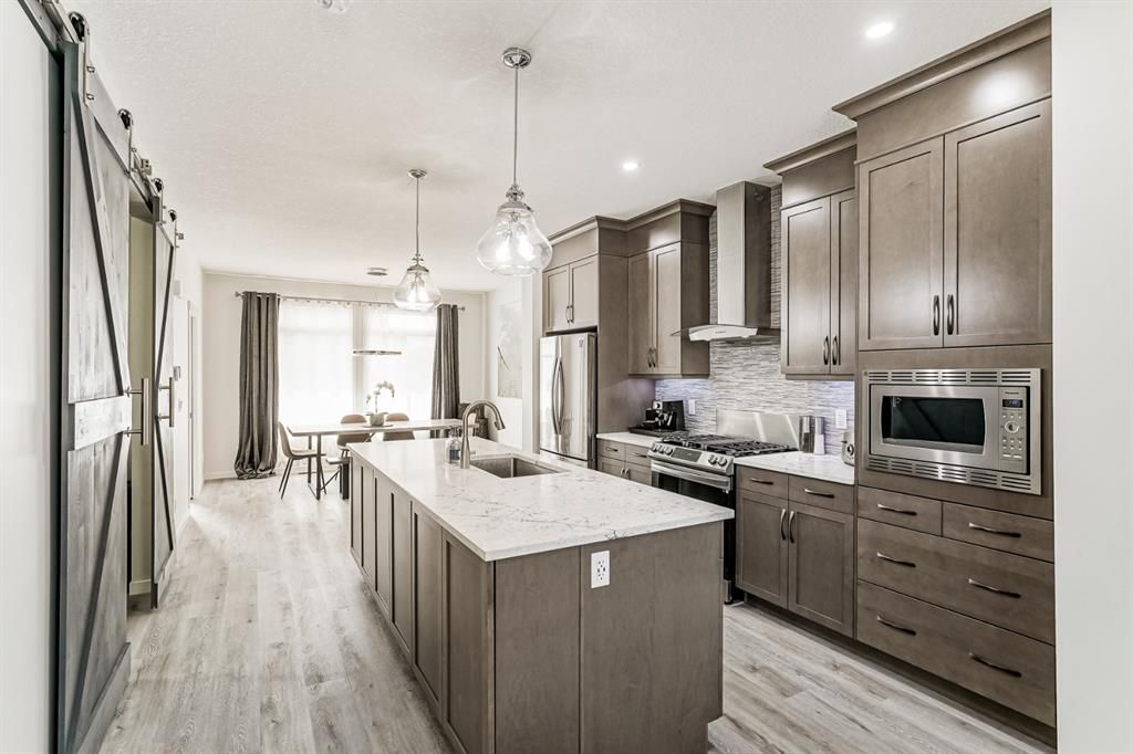 Main Photo: 161 Belmont Boulevard SW in Calgary: Belmont Detached for sale : MLS®# A1256630