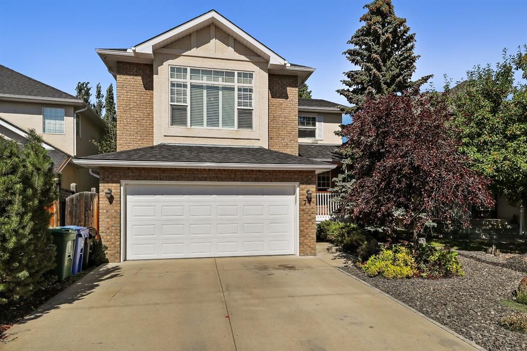 Main Photo: 77 Strathridge Crescent SW in Calgary: Strathcona Park Detached for sale : MLS®# A1254965