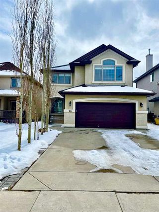 Photo 1: 1A Tusslewood Drive NW in Calgary: Tuscany Detached for sale : MLS®# A2116785