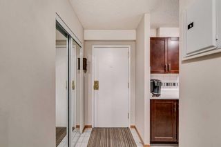 Photo 2: 403 3420 50 Street NW in Calgary: Varsity Apartment for sale : MLS®# A2119920