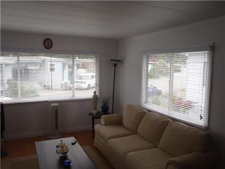 Photo 4: 40 4200 DEWDNEY TRUNK Diversion in Coquitlam: Ranch Park Manufactured Home for sale in "HideAway Park" : MLS®# V923597