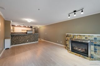 Photo 1: 105 20268 54 Avenue in Langley: Langley City Condo for sale in "Brighton Place" : MLS®# R2678799
