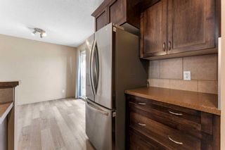 Photo 14: 206 Panatella Park NW in Calgary: Panorama Hills Row/Townhouse for sale : MLS®# A2091772