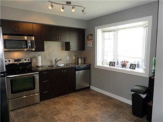 Photo 9: 2 133 COPPERPOND Heights SE in : Copperfield Townhouse for sale (Calgary)  : MLS®# C3622800