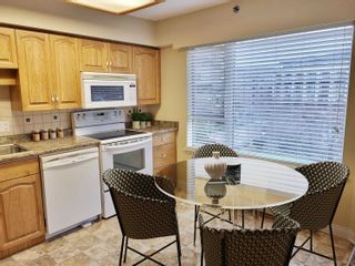 Photo 6: 306 3150 GLADWIN Road in Abbotsford: Central Abbotsford Condo for sale in "REGENCY TOWERS" : MLS®# R2829388