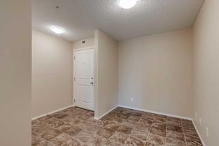 Photo 3: 9301 403 Mackenzie Way SW: Airdrie Apartment for sale : MLS®# A2090756