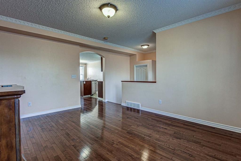 Photo 5: Photos: 64 Eversyde Circle SW in Calgary: Evergreen Detached for sale : MLS®# A1090737