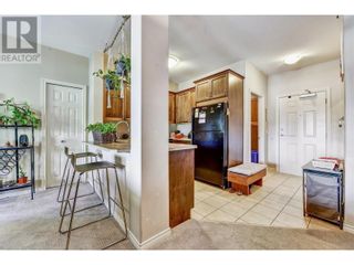 Photo 4: 1007 Harvey Avenue Unit# 404 in Kelowna: House for sale : MLS®# 10313143