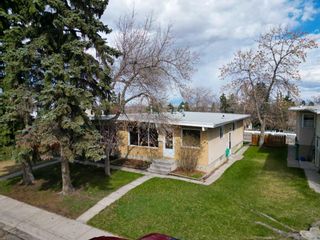 Photo 2: 7114 - 7116 Hunterville Road NW in Calgary: Huntington Hills Full Duplex for sale : MLS®# A2127434
