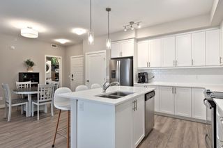 Photo 4: 408 100 Auburn Meadows Manor SE in Calgary: Auburn Bay Apartment for sale : MLS®# A2107067