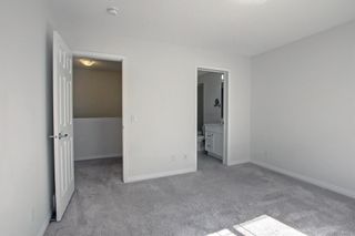 Photo 18: 118 Hillcrest Gardens SW: Airdrie Row/Townhouse for sale : MLS®# A1202882